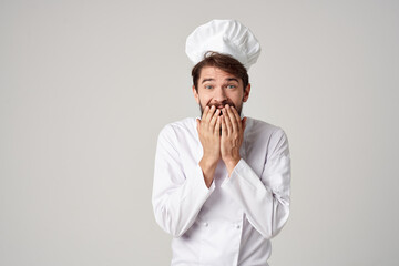 male cook Chef uniform Cooking emotions gourmet posing studio