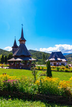 Landscape Of The Maramures Area With The Birsana Monastery, Whose Architecture Is Traditional And Specific To Romania