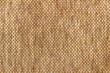 Tło z brązowej, naturalnej tkaniny z widoczną strukurą
