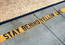 Stay Behind Yellow Line Sign