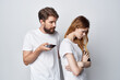 © SHOTPRIME STUDIO - man and woman family with phones in hand communication light background