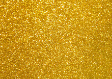 Golden Yellow Glitter Bokeh Background.  Photo Can Be Used For New Year, Christmas And All Celebration Concepts.