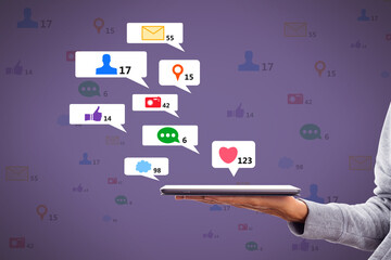 Poster - Close up of hand holding tablet with creative social media icons on abstract background. Like, network, technology and communication concept.