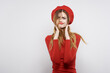 © SHOTPRIME STUDIO - beautiful woman in a red sweater cosmetics emotion isolated background