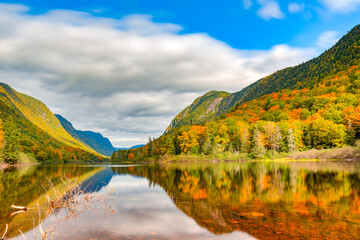 Wall Mural - Wonderful and colorful Jacques-Cartier valley and its vibrant foliage at Fall, Jacques-Cartier national park, Quebec, Canada