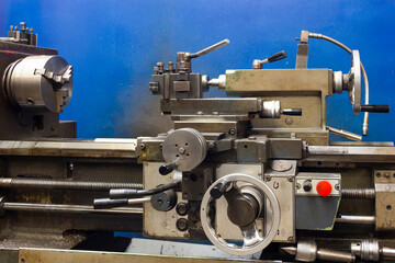 Steel lathe machine in industrial factory. Manufacture equipment, engineering technology concepts