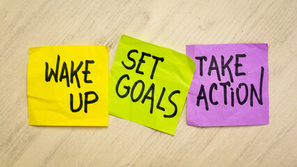Wall Mural - wake up, set goals, take action - a set of motivational reminder notes, business or personal development concept