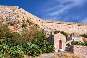 Sticker - Orthodox chapel and stone fortifications of a Venetian fortress in the city of Rethymno on the island of Crete