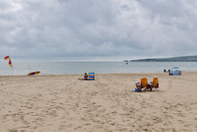 10 September 2021 - Poole, UK: Deserted Beach On Dull Cloudy Day