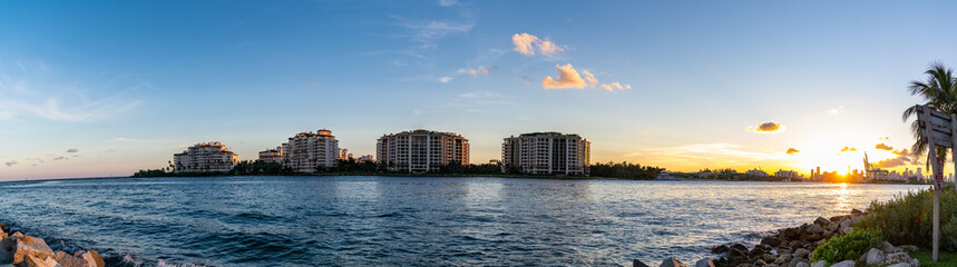 Wall Mural - Aerial panorama view of Miami beach bayfront scene at sunset