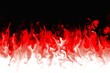 © nopphadol - red flames are burning on black background