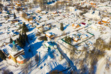 Fototapeta Miasta - Scenic view from drone of Venyov cityscape with complex of Epiphany church and church of Kazan Icon of Mother of God on site of former monastery in winter, Russia