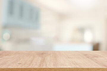 Wall Mural - empty table board and defocused modern kitchen background. product display concept