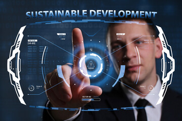 Business, Technology, Internet and network concept. Young businessman working on a virtual screen of the future and sees the inscription: Sustainable development