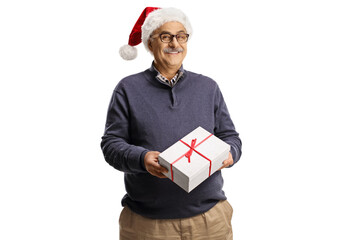 Poster - Mature man wearing a santa claus hat and holding a gift box