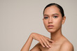 © Johnstocker - Beauty Portrait Beautiful asian Model Touching Face by Hand