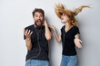 © SHOTPRIME STUDIO - family in black t-shirts phone fun together friendship light background