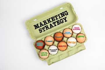 Wall Mural - marketing strategy. chicken eggs in a cardboard box