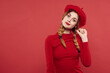 © SHOTPRIME STUDIO - pretty woman with a red cap on his head glamor isolated background