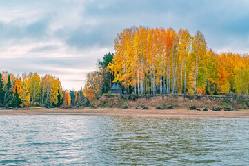 Wall Mural - panoramic view of the bright colorful trees along the bank of the chusovaya river russia perm krai. 