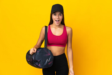 Wall Mural - Teenager sport girl with sport bag with surprise facial expression