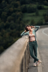 Poster - Shallow focus of a caucasian female posing in the park  with blurred background