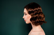 © Beauty Hero - Profile side photo of young calm peaceful woman look copyspace fresh pure naked shoulders isolated on green color background