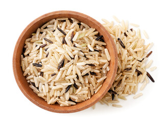 Wall Mural - Wild unpolished rice in a plate on a white background, isolated. Top view