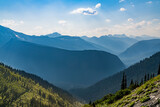 Fototapeta Góry - Hazy Mountain Peaks in Glacier National Park