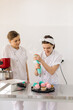 © Scopio - Two female chefs making cupcakes