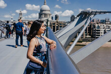 Woman In Blue Floral Dress Standing Near St. Paul's Cathedral In London, United Kingdom