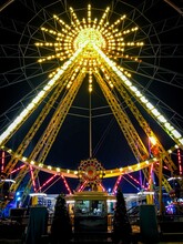 Yellow And Blue Ferris Wheel During Night Time