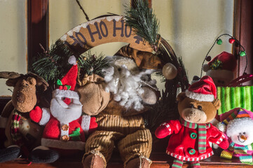 Wall Mural - Christmas concept with various Christmas plush toys including Santa Claus , teddy bears and snowman , selective focus