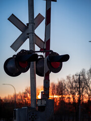 Poster - Vertical shot of railway crossing mechanism in Airdrie, Alberta