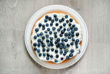 Wall Mural - Blueberry cake with whipped cream