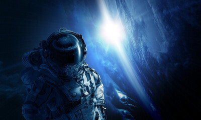 Wall Mural - astronaut at spacewalk . mixed media