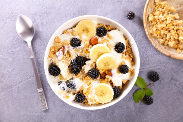 Wall Mural - healthy breakfast with granola,  milk and fruits