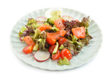 Fototapeta  - Tasty salad with salmon, egg and fresh vegetables in plate on white background