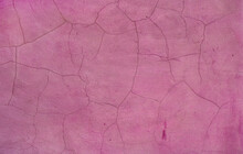 Old Cracked Pink Wall - Weathered And Damaged Surface Texture From A Facade Background 