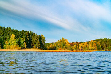 Wall Mural - panoramic view of the bright colorful trees along the bank of the kama river russia perm krai. autum