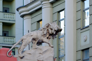 Wall Mural - Lion sculpture on the fence of the old decorated building in Kyiv Ukraine