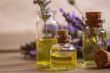 © Milena - Lavender essential oil in a small bottle. Selective focus.