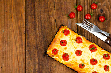 Wall Mural - Homemade baking. Cherry tomato snack pie. Studio Photo.