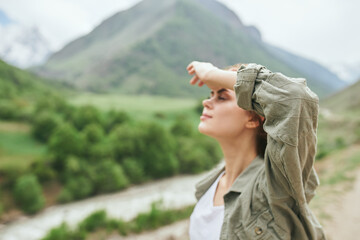 Wall Mural - woman hiker mountains landscape travel freedom fresh air