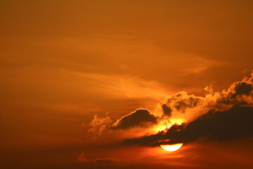 Wall Mural - sunset on sky and sun ray back silhouette evening cloud