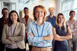 © luckybusiness - group of successful business people, multiethnic employees workers pose at workplace.