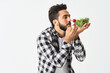 © VICHIZH - emotional bearded man in plaid shirt plate with salad