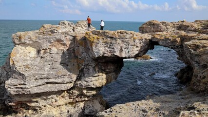 Sticker - Rock arch on cliffs in Tyulenovo village, ont Black Sea shore in Bulgaria, 4k video