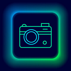 Sticker - Glowing neon line Photo camera icon isolated on black background. Foto camera. Digital photography. Colorful outline concept. Vector