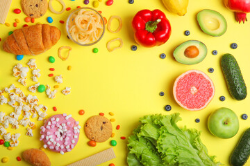 healthy foods and unhealthy foods on a colored background close-up top view.